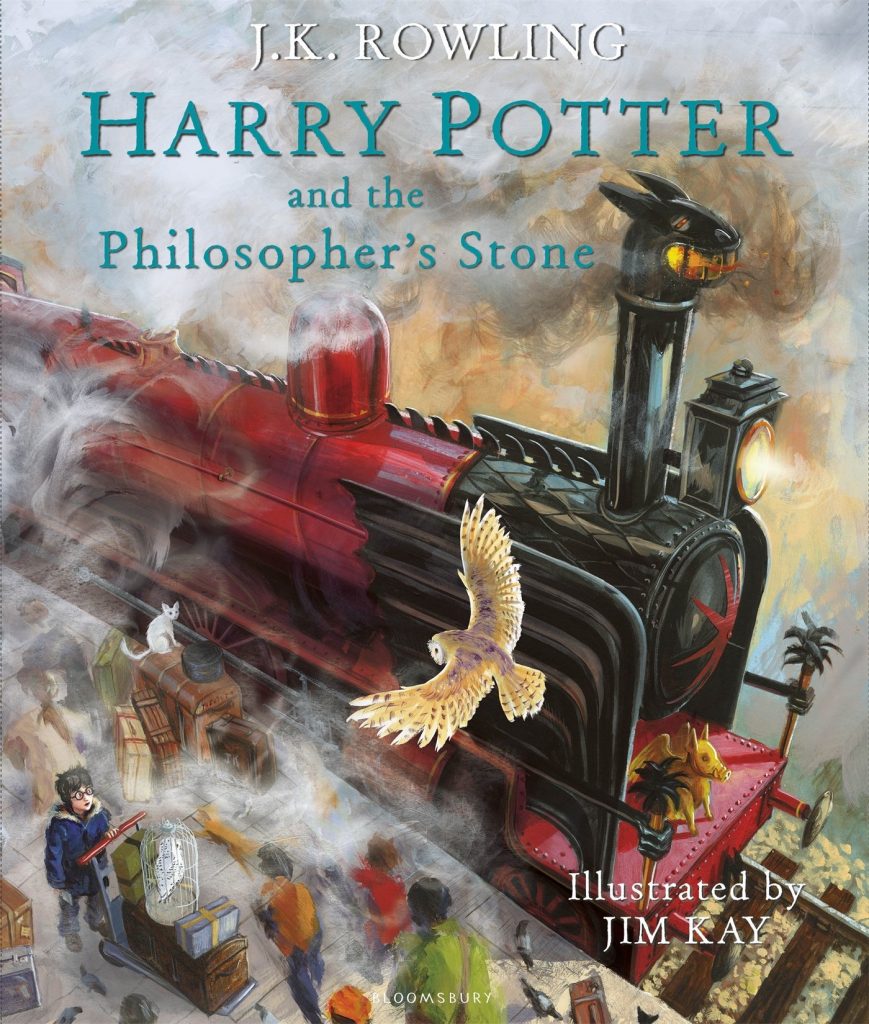 J.K. ROWLING
HARRY POTTER and the hilosopher's Stone
Image description - Steaming red and engine with a dragon head top drawing in at a platform.
White owl in the foreground swooping down
Black haired boy looking up at it amongst all the others on the platform