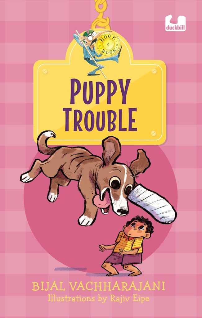 Book Cover
Text: Puppy Trouble
Bijal Vachharajani
Illustrations by Rajiv Eipe
Image:
Illustration of a puppy with one paw bandaged leaping over a sceptical boy
