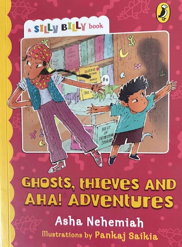 Book cover
Text:
A Silly Billy Book
Ghosts, Thieves and Aha! Adventures
Asha Nehemiah
Illustrated by Pankaj Saikia
Illustration of a boy and a girl looking around suspiciously. Bookshelf in the background.