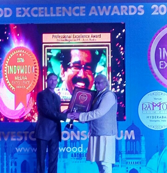 receiving-the-indywood-media-excellence-award