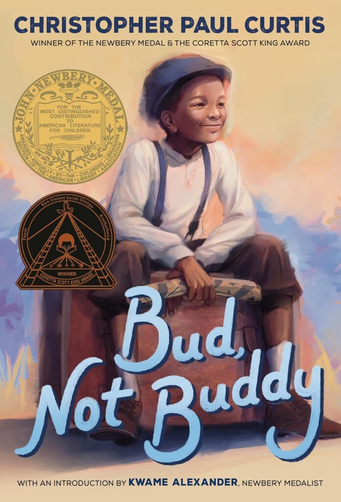 Book Cover
Christopher Paul Curtis
Winner of the Newbery Medal & the Coretta Scott King Award
Bud, Not Buddy
Image of a smiling boy sitting on a suitcase